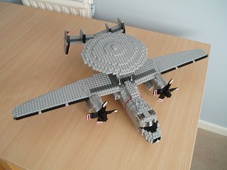 Illustration for article titled Giant LEGO B-1B Bomber Escorted by Fighters, Hawkeye Aircraft